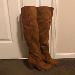 Over the knee brown boot. Faux material.